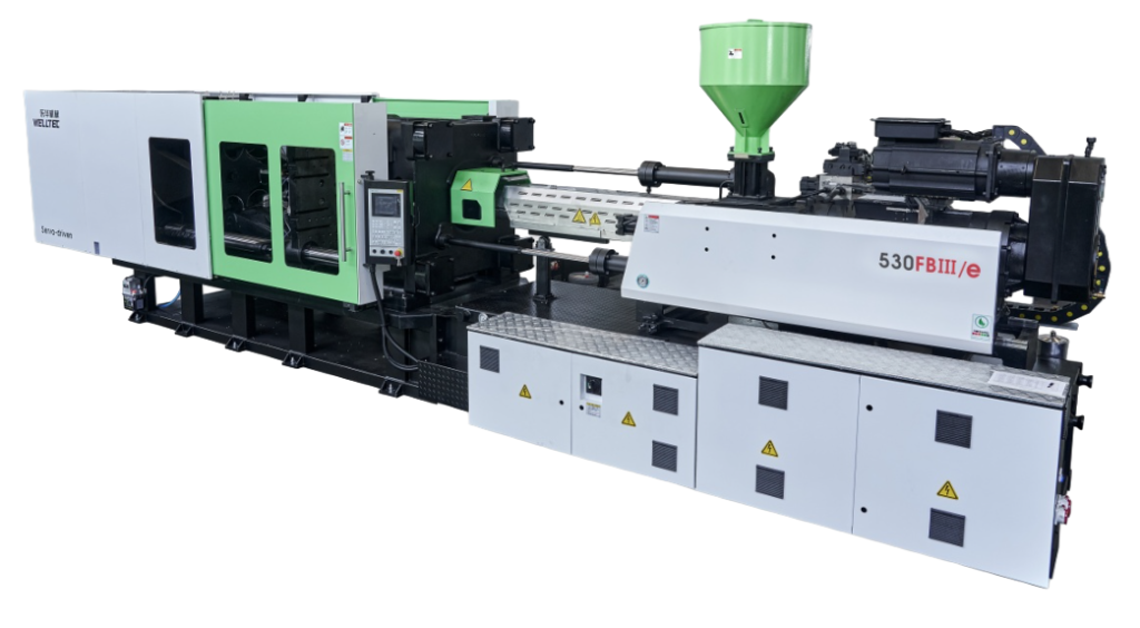 Welltec FBIII/e meyve kasası üretimine özel plastik enjeksiyon makinesi – yüksek dayanımlı yapı, geniş açılma tasarımı ve hassas enjeksiyon kontrolü.